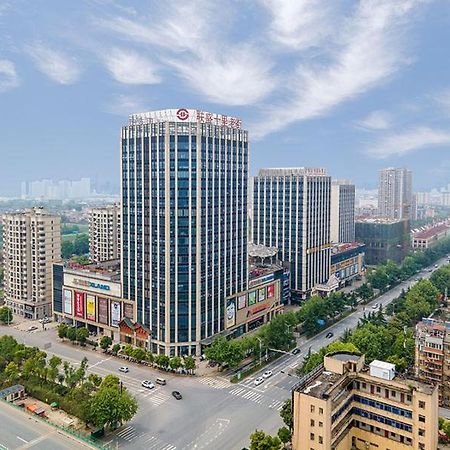 Vienna International Hotel Jiujiang Shili Street Exteriör bild